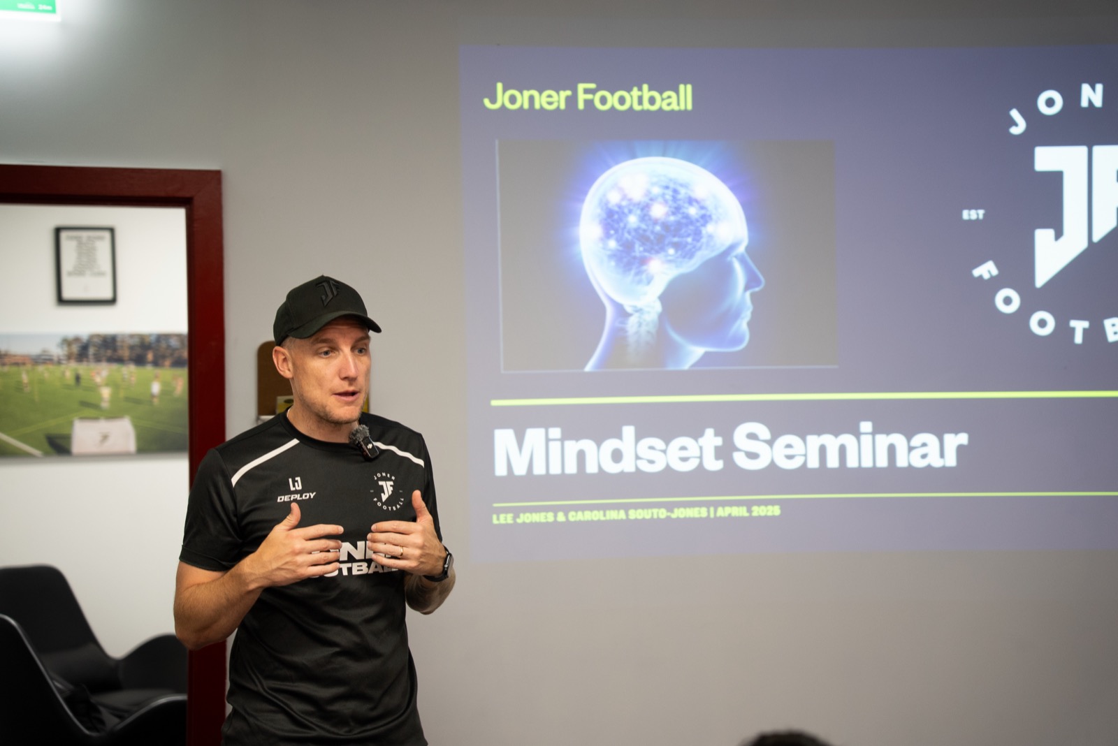 Lee presenting a Joner Football mindset seminar